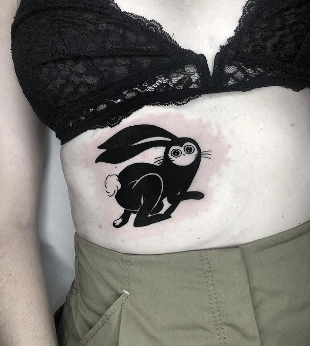 Blackwork Rabbit tattoo on Stomach