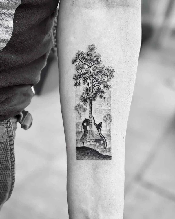Blackwork Guitar, Tree tattoo on Forearm