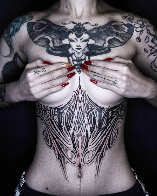 Blackwork Face, Geometric tattoo on Chest