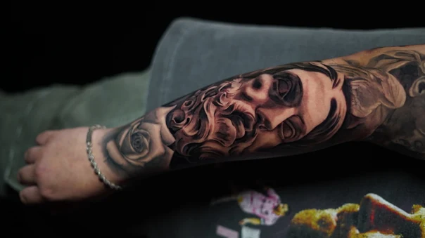 Realism Face, Rose tattoo on Forearm