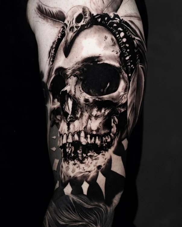Black & Grey Skull, Feathers tattoo on Upper Arm