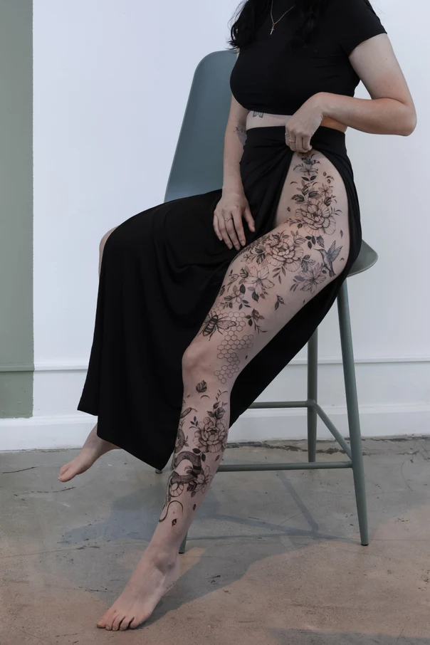 Illustrative Flowers, Bee tattoo on Thigh