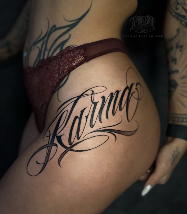 Calligraphy Lettering tattoo on Thigh