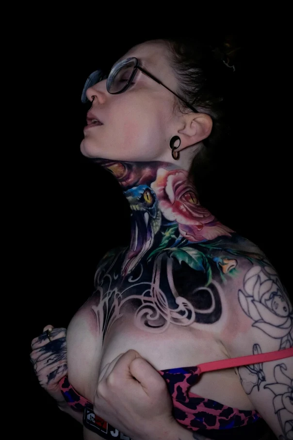Illustrative Snake, Rose tattoo on Neck