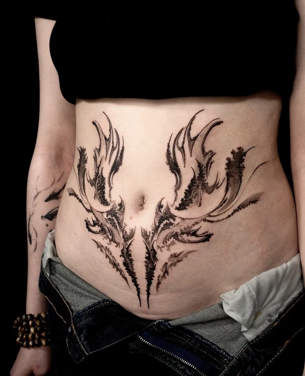 Abstract Abstract tattoo on Stomach