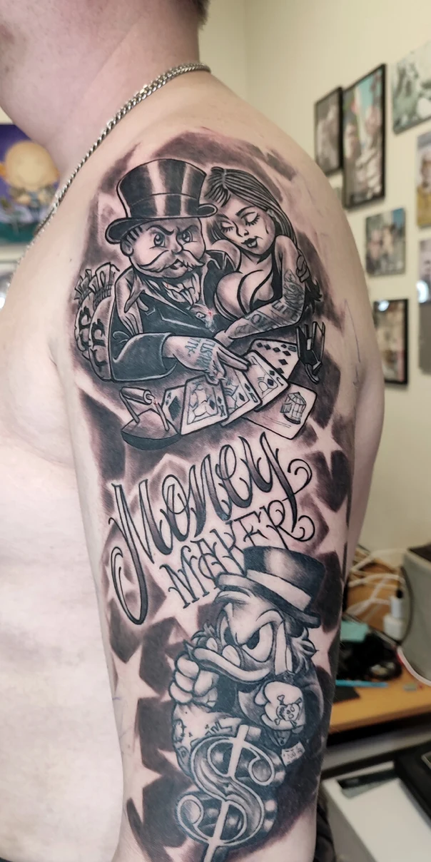 Chicano Characters, Money tattoo on Upper Arm