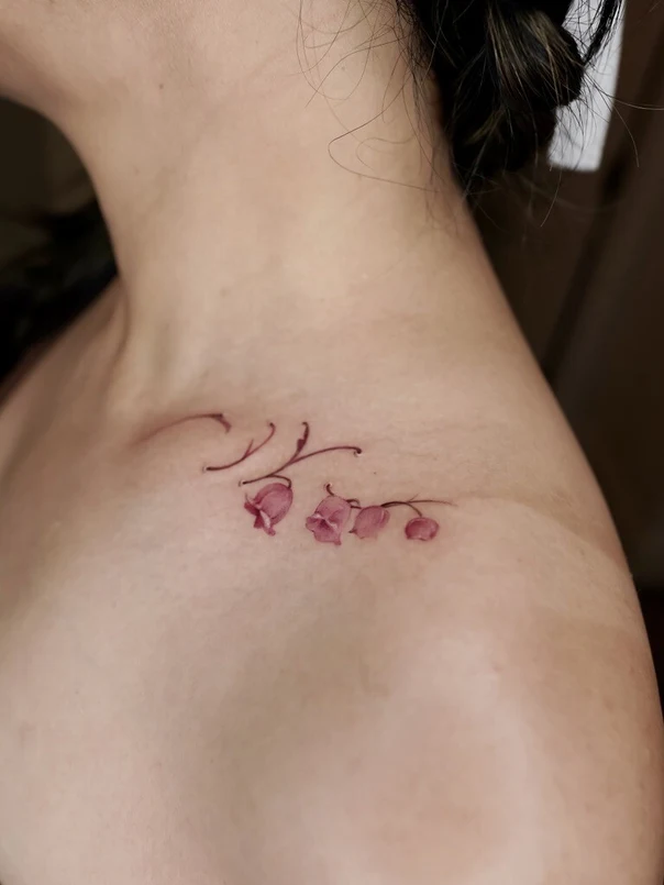 Botanic Flowers tattoo on Collarbone