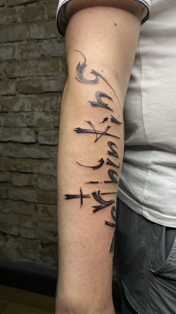 Calligraphy Abstract, Lettering tattoo on Forearm