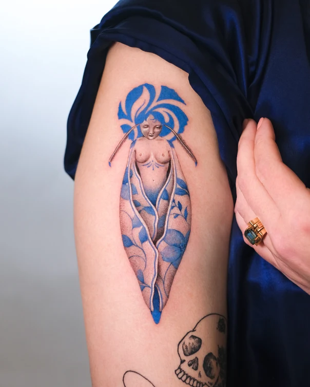 Illustrative Figure, Floral tattoo on Upper Arm