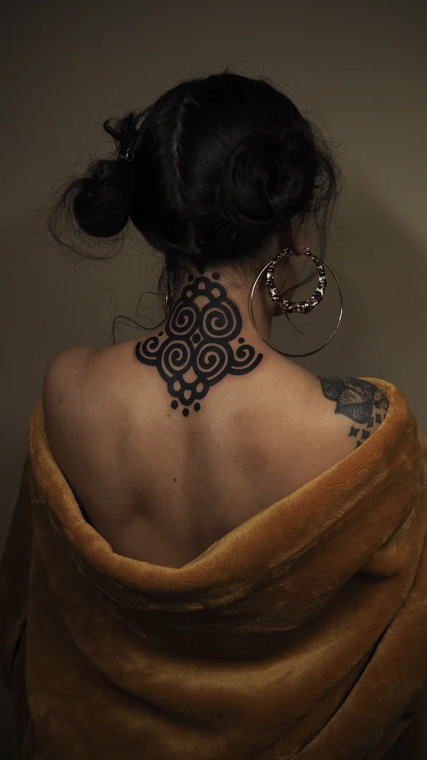 Ornamental Geometric, Swirls tattoo on Back of neck