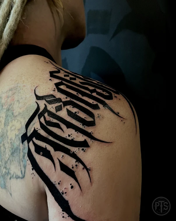 Calligraphy Lettering tattoo on Shoulder