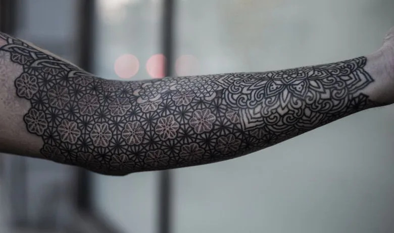 Ornamental hand tattoo by Dillon Forte