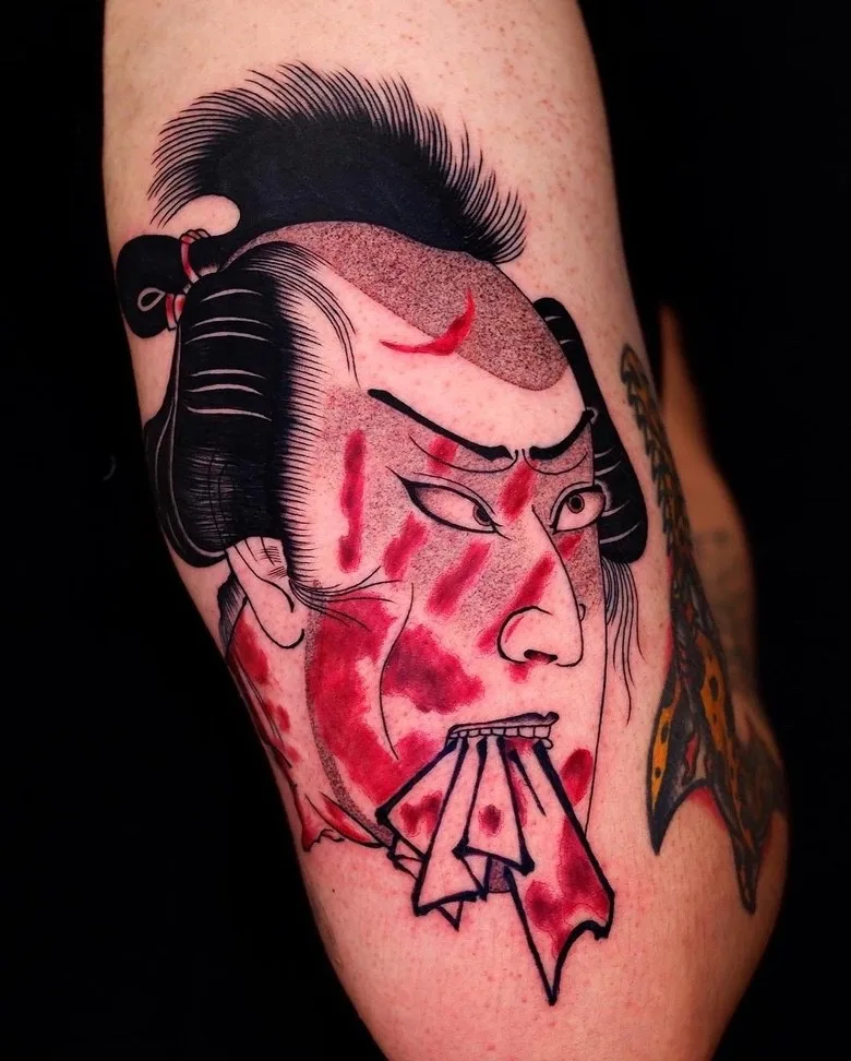Japanese style face tattoo