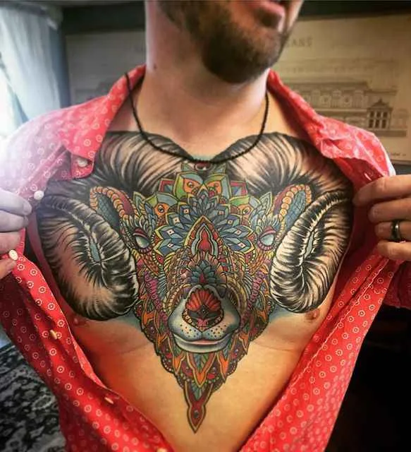 male color ornamental tattoo auf chest #497 | Tätowierer Johnny Smith
