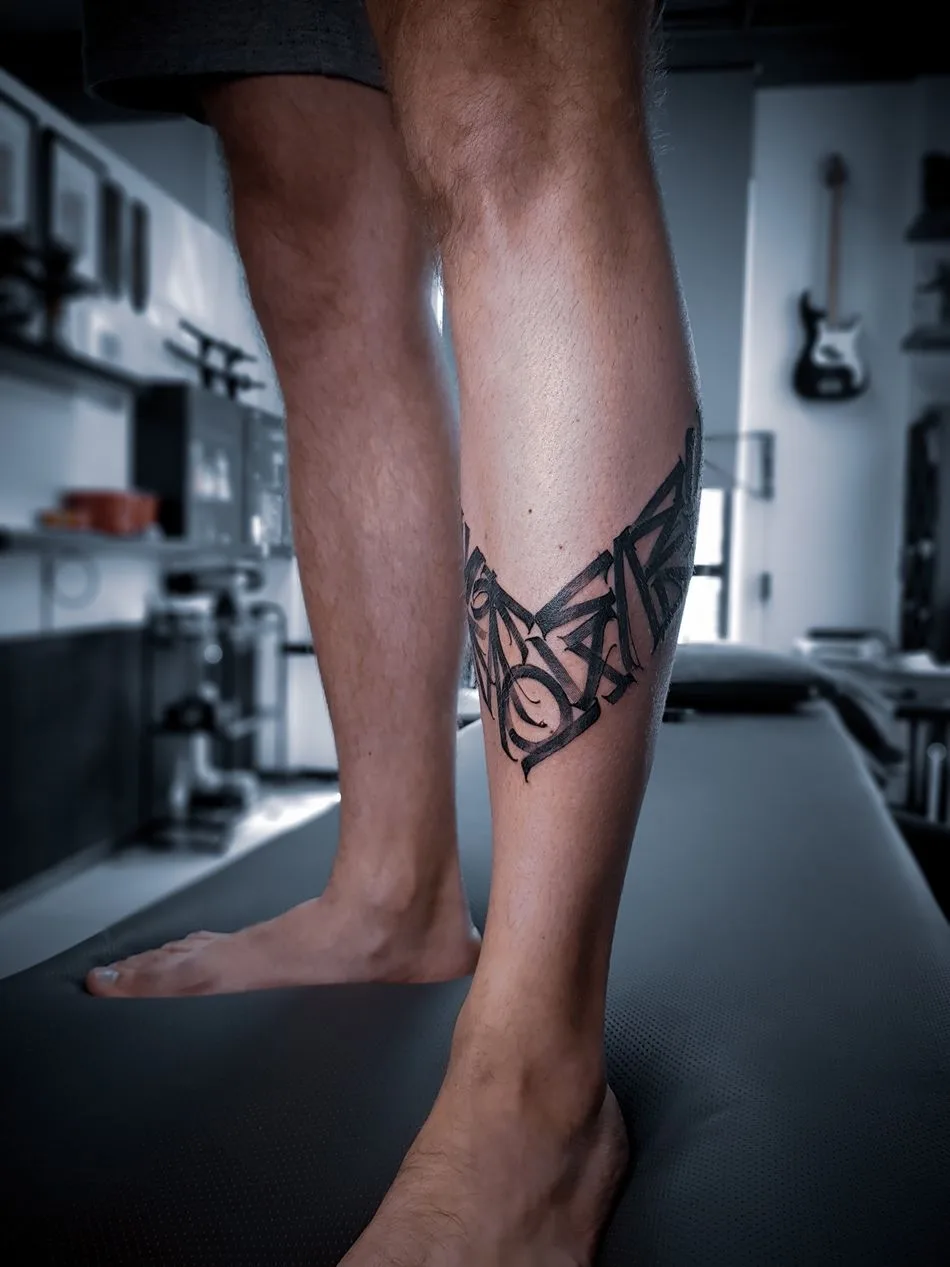 Tattoo artist Igor Klimin, color and black lettering, Calligraphy tattoo, NBK Tattoo Collective | Krasnodar, Russia
