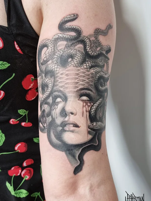 Illustrative tattoo by Loren Fetterman in Todmorden
