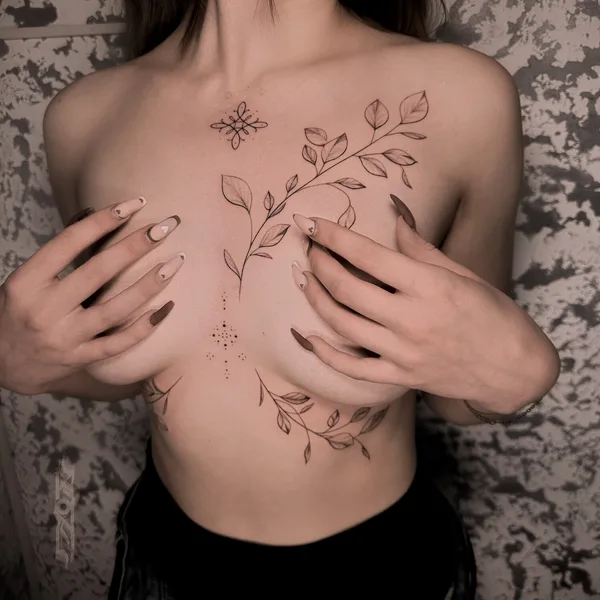 Feminine tattoo by Евгений Коваль in Moscow