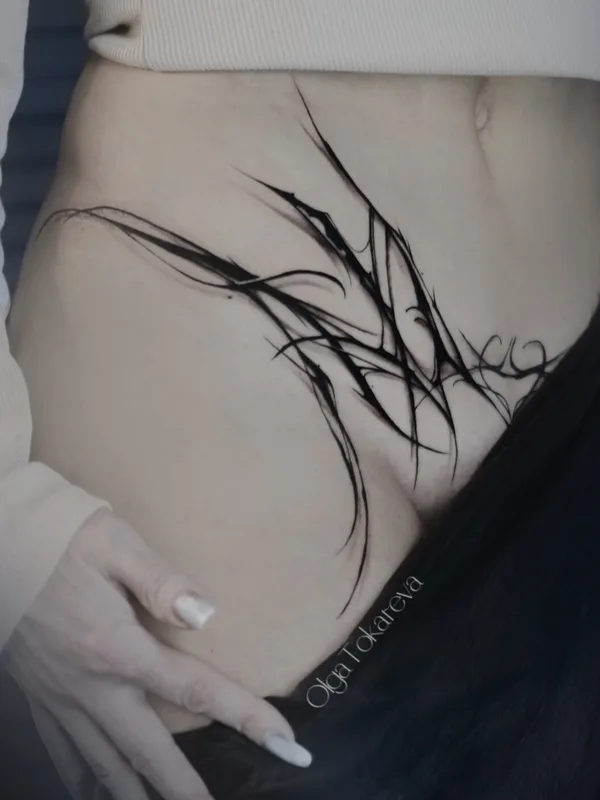 female black darklettering татуировка на stomach #101935 | Тату мастер Ольга Токарева
