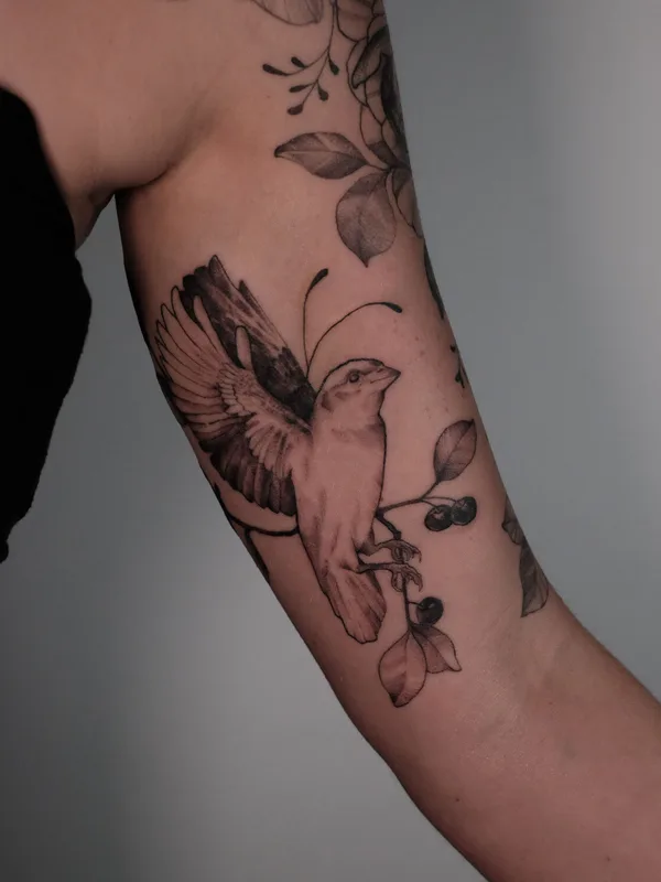 female blackandgrey illustrative tattoo on biceps #95731 | Tattoo Artist Lisa Litovkin