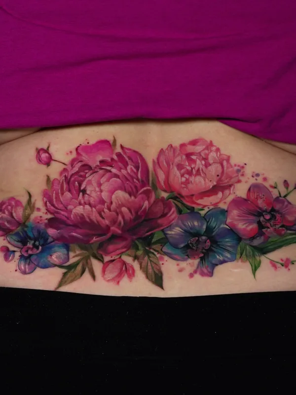 female color watercolor tattoo on lower back #93344 | Tattoo Artist Yana Sulina