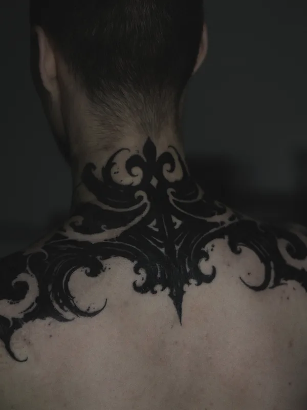 male black ornamental Tatuaggio su back #93704 | Tatuatore Алексей Гурбатов