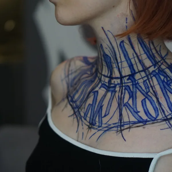 Calligraphy tattoo by Nikita Presnyakov in Tbilisi