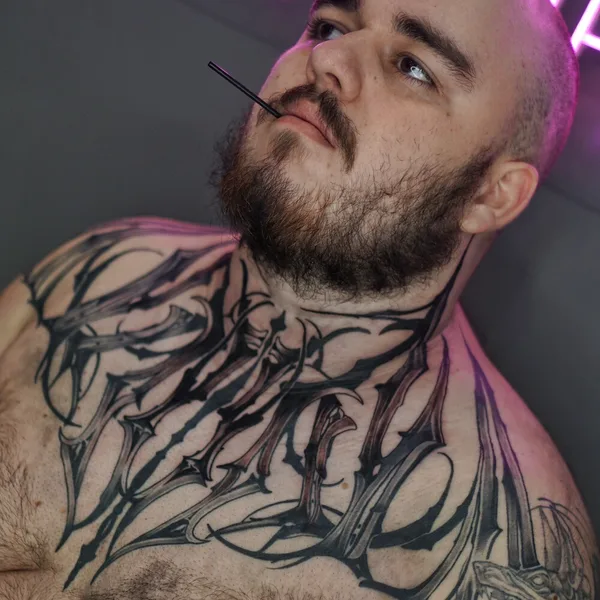 Calligraphy tattoo by Nikita Presnyakov in Tbilisi
