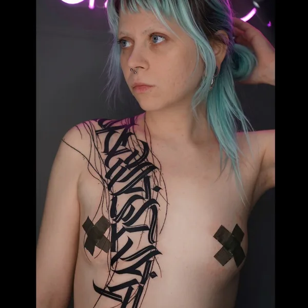 Calligraphy tattoo by Nikita Presnyakov in Tbilisi