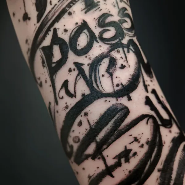 Calligraphy tattoo by Nikita Presnyakov in Tbilisi