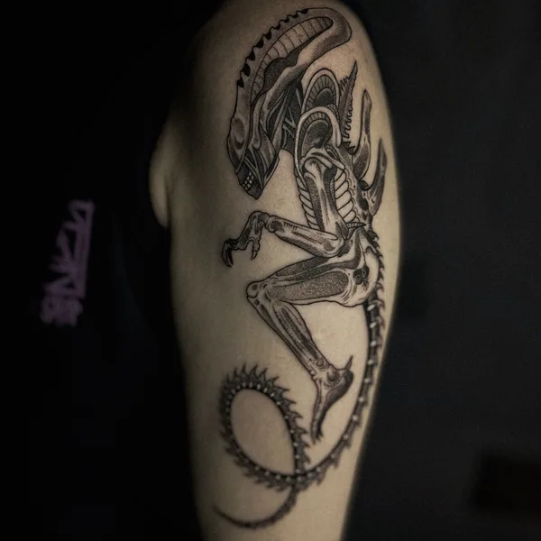 Graphic tattoo by Daria Duck in Tbilisi