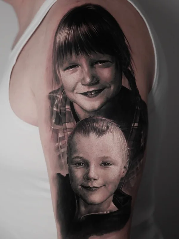 black and grey realism tattoo on upper arm #95971 | Tattoo Artist Roman Ignatenko