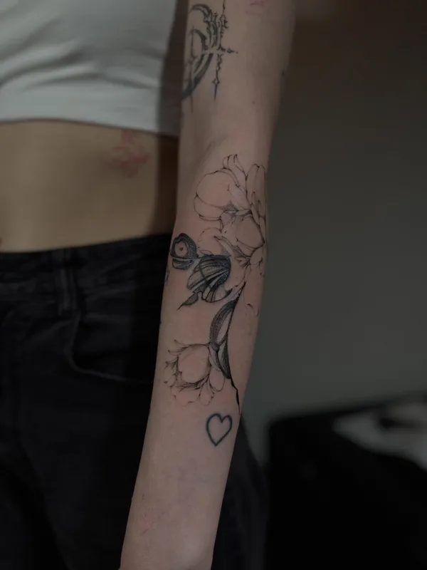 female black and grey sketch tattoo on forearm #98967 | Tattoo Artist julia wzertis
