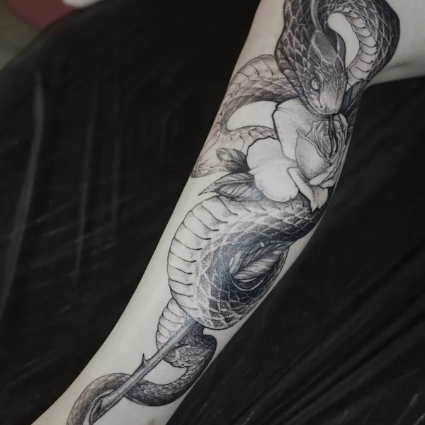 Black tattoo by Ирина Матвеева in Moscow