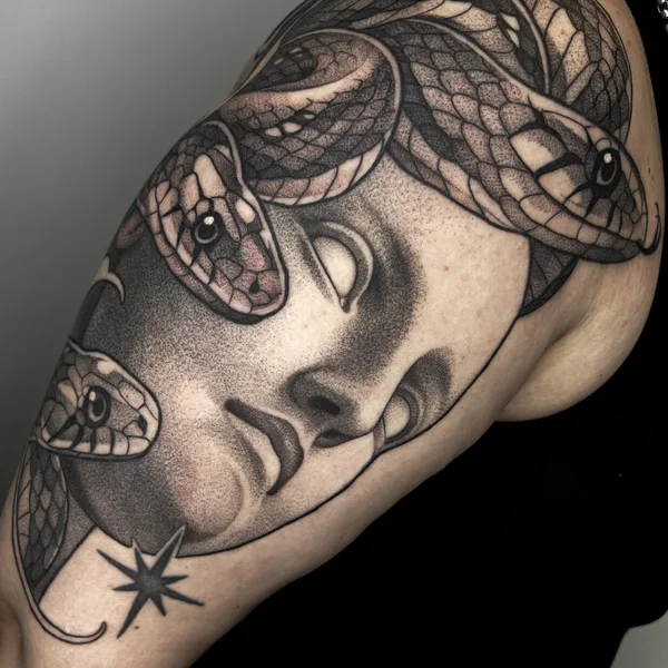 Graphic tattoo by Jole in Helsinki