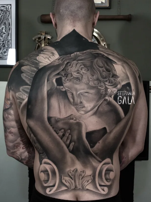 male blackandgrey realism tattoo on back #103280 | Tattoo Artist Stefania Gala