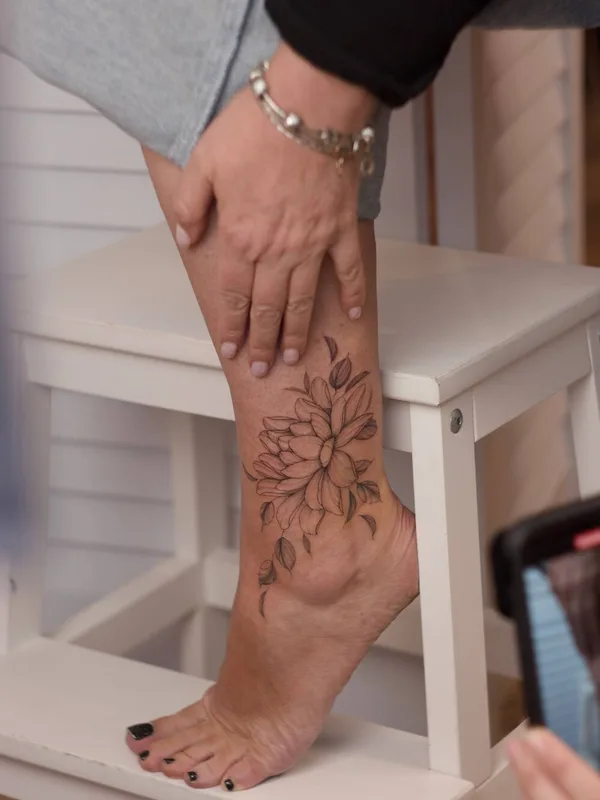 Botanical tattoo by Анастасия Ковязина in Saint Petersburg