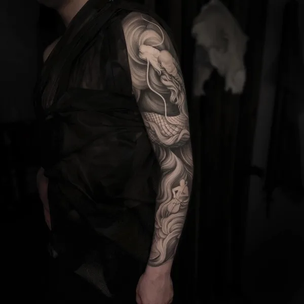Graphic tattoo by Анастасия Шарм in Moscow