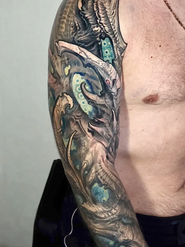 male color biomechanical tattoo on full sleeve #97065 | Tattoo Artist Kirill Putiatin 