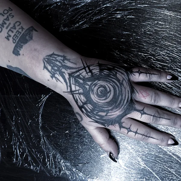 Graphic tattoo by Polina Inquizitsiya in Moscow