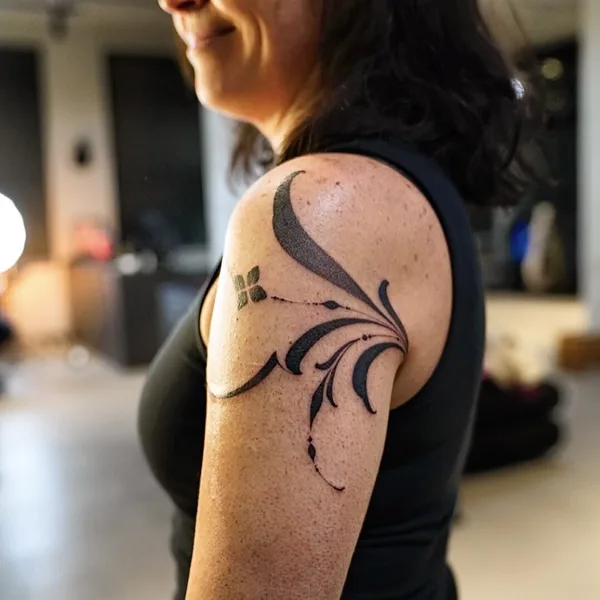 Graphic tattoo by Sergey Anuchin in Moscow