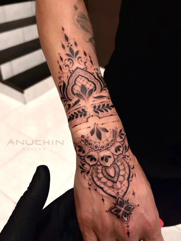 female black ornamental татуировка на arm #105708 | Тату мастер Sergey Anuchin