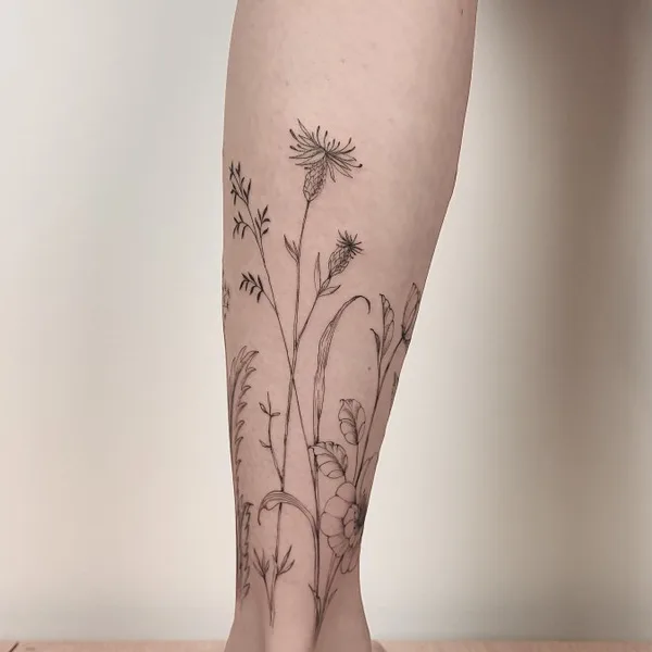 Botanical tattoo by Daria Inkwaves in Montréal