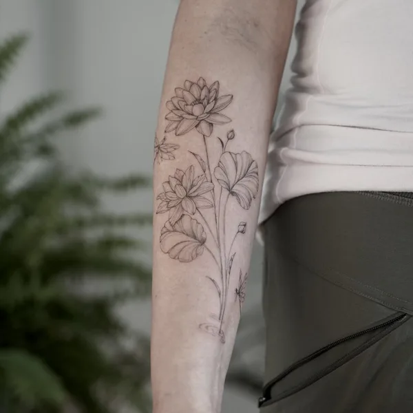 Botanical tattoo by Daria Inkwaves in Montréal