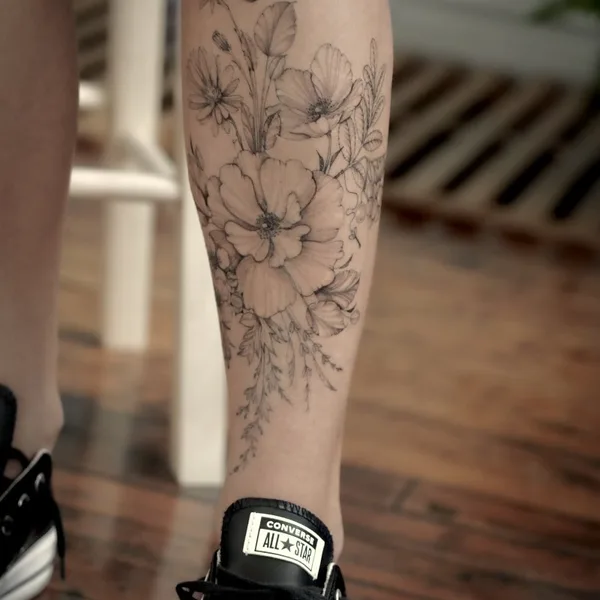 Botanical tattoo by Daria Inkwaves in Montréal