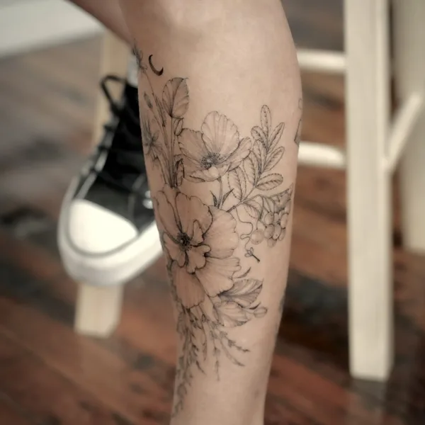 Botanical tattoo by Daria Inkwaves in Montréal