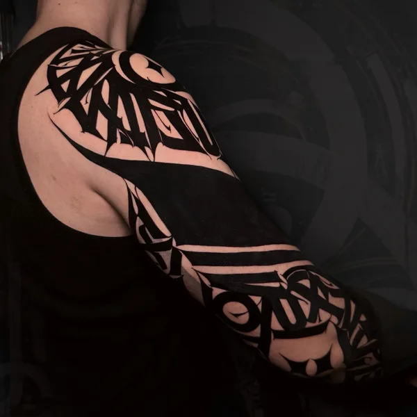 Lettering tattoo by Mayya Gri in Moscow
