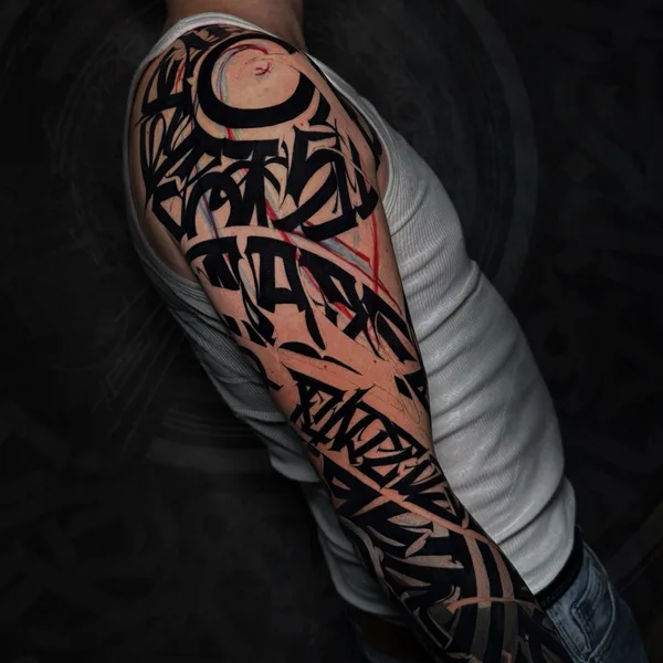 Lettering tattoo by Mayya Gri in Moscow