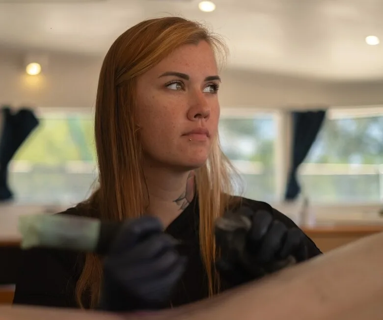 Tattooing on the Wave: How Elizabeth Collinson Turned a Catamaran into a Dream Studio - image 6