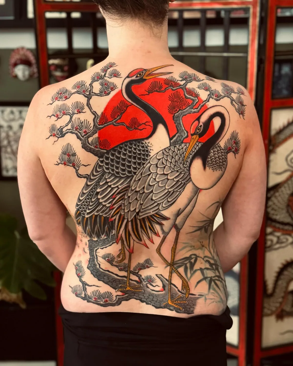 Heron tattoo on the back