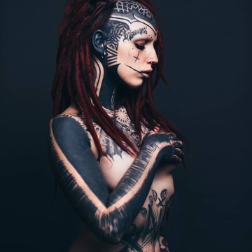 Татуировка в восхитительных фотографиях Laurent Ponce